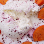 Shiso hibiscus infused salt on burratta and persimmon slices